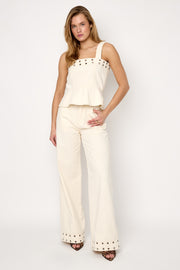 Opvallende denim top met oogjes